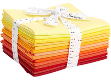 Load image into Gallery viewer, 14-piece fat quarter bundle in sunrise and sunset colors, 100% cotton, tied with a ribbon, perfect for quilting and crafting.
